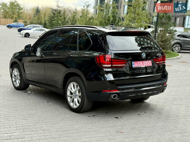 Черный БМВ Х5, объемом двигателя 3 л и пробегом 249 тыс. км за 23700 $, фото 2 на Automoto.ua