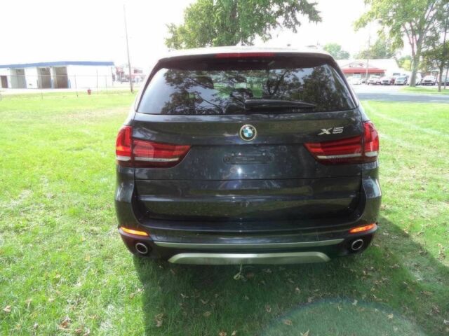 Черный БМВ Х5, объемом двигателя 3 л и пробегом 73 тыс. км за 12000 $, фото 6 на Automoto.ua