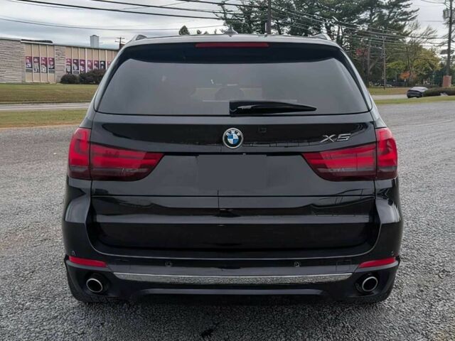 Черный БМВ Х5, объемом двигателя 3 л и пробегом 72 тыс. км за 16500 $, фото 5 на Automoto.ua