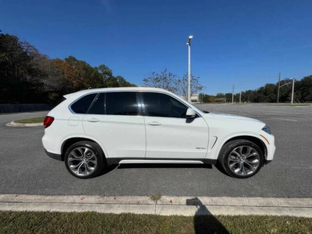 Чорний БМВ Х5, об'ємом двигуна 3 л та пробігом 73 тис. км за 14600 $, фото 3 на Automoto.ua