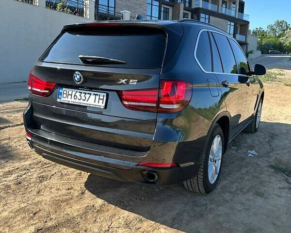 Черный БМВ Х5, объемом двигателя 2.98 л и пробегом 134 тыс. км за 28000 $, фото 1 на Automoto.ua