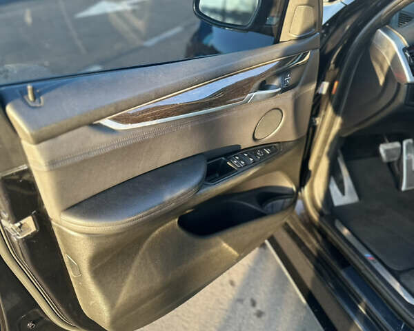 Черный БМВ Х5, объемом двигателя 3 л и пробегом 178 тыс. км за 34500 $, фото 10 на Automoto.ua