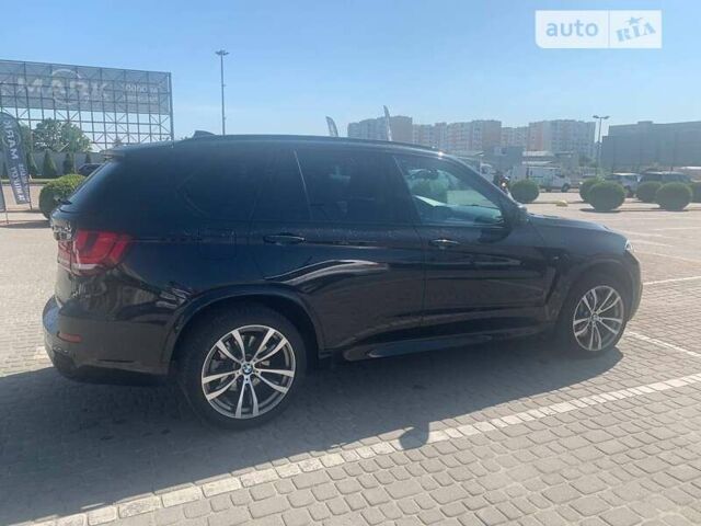 Чорний БМВ Х5, об'ємом двигуна 3 л та пробігом 233 тис. км за 31500 $, фото 4 на Automoto.ua