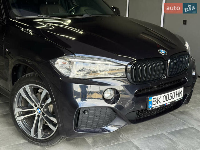 Чорний БМВ Х5, об'ємом двигуна 3 л та пробігом 218 тис. км за 33999 $, фото 1 на Automoto.ua