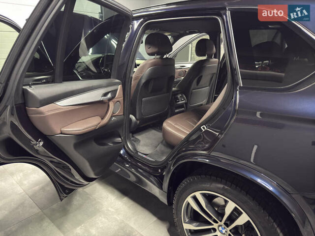 Чорний БМВ Х5, об'ємом двигуна 3 л та пробігом 218 тис. км за 33999 $, фото 67 на Automoto.ua