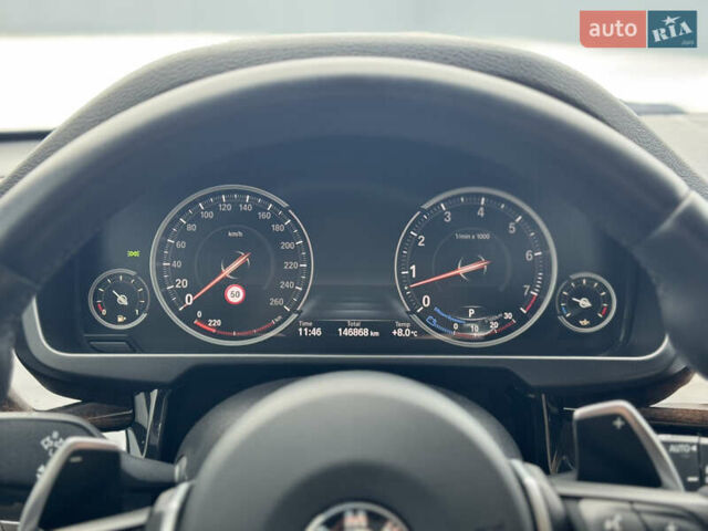 Черный БМВ Х5, объемом двигателя 3 л и пробегом 146 тыс. км за 25950 $, фото 22 на Automoto.ua
