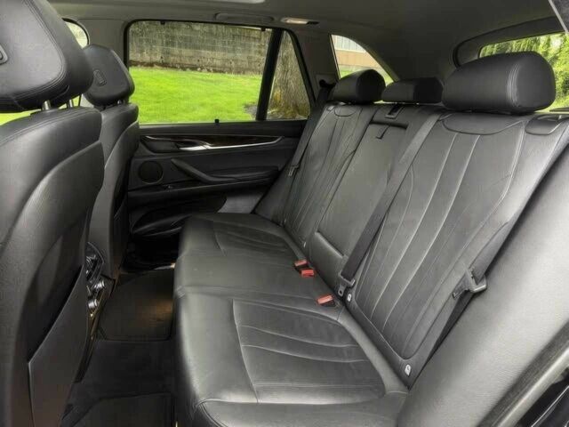 Чорний БМВ Х5, об'ємом двигуна 3 л та пробігом 77 тис. км за 11200 $, фото 10 на Automoto.ua