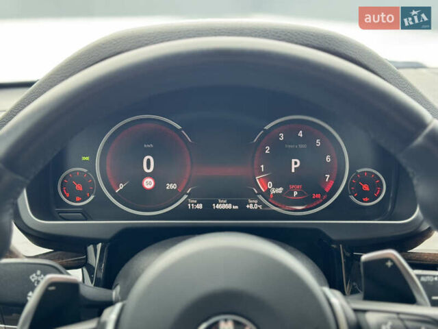 Черный БМВ Х5, объемом двигателя 3 л и пробегом 146 тыс. км за 25950 $, фото 24 на Automoto.ua