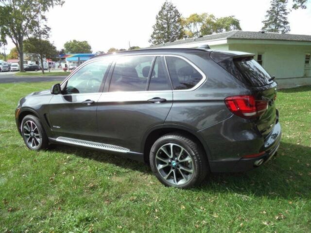 Черный БМВ Х5, объемом двигателя 3 л и пробегом 73 тыс. км за 12000 $, фото 5 на Automoto.ua