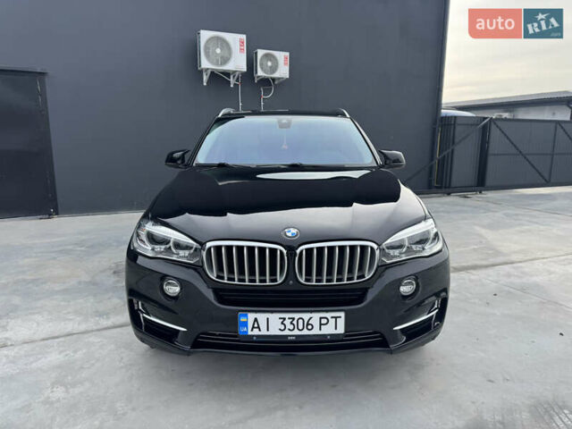Черный БМВ Х5, объемом двигателя 3 л и пробегом 146 тыс. км за 25950 $, фото 1 на Automoto.ua
