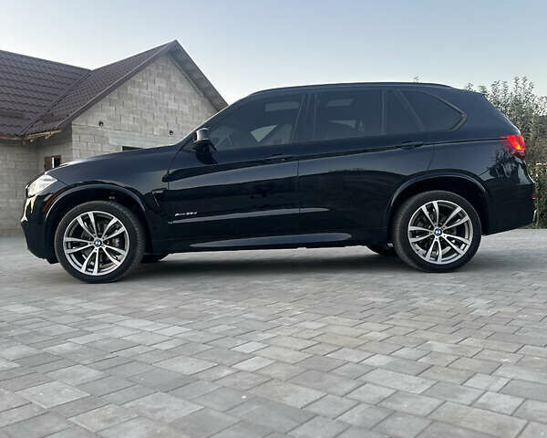 Чорний БМВ Х5, об'ємом двигуна 3 л та пробігом 320 тис. км за 25950 $, фото 48 на Automoto.ua