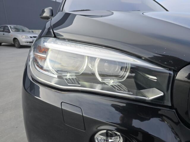 Чорний БМВ Х5, об'ємом двигуна 2 л та пробігом 152 тис. км за 33990 $, фото 1 на Automoto.ua