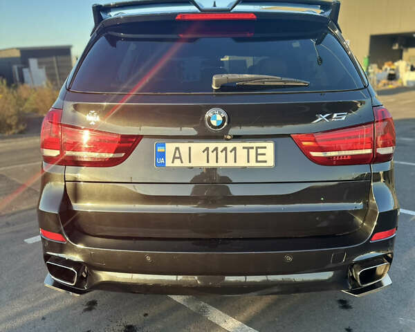 Черный БМВ Х5, объемом двигателя 3 л и пробегом 178 тыс. км за 34500 $, фото 7 на Automoto.ua