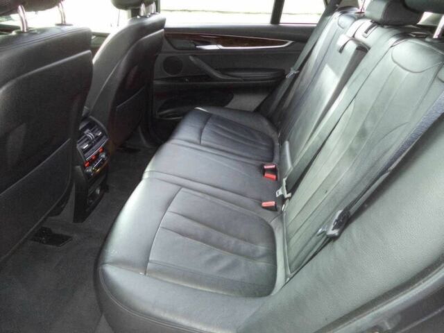 Черный БМВ Х5, объемом двигателя 3 л и пробегом 78 тыс. км за 19800 $, фото 10 на Automoto.ua