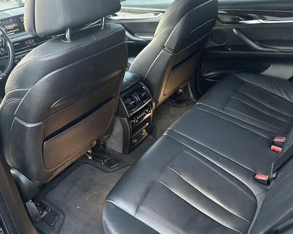 Чорний БМВ Х5, об'ємом двигуна 3 л та пробігом 320 тис. км за 25950 $, фото 52 на Automoto.ua