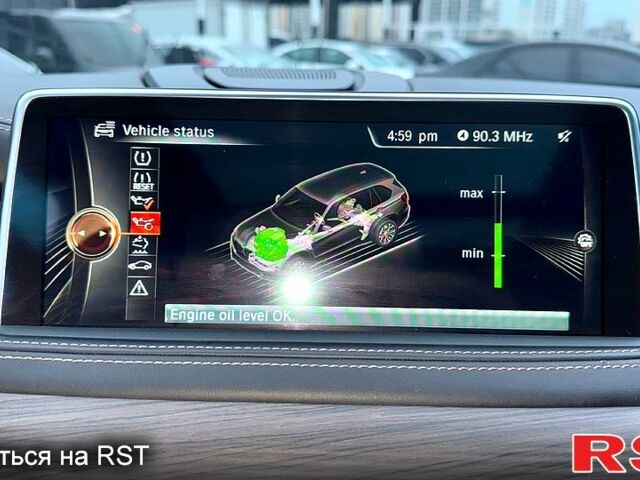 Чорний БМВ Х5, об'ємом двигуна 3 л та пробігом 200 тис. км за 29450 $, фото 2 на Automoto.ua