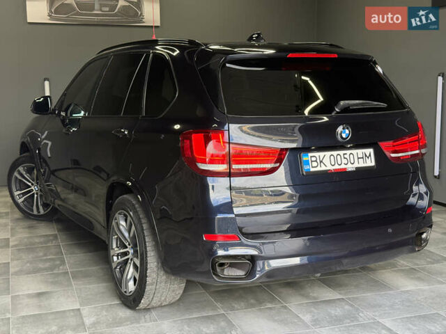 Чорний БМВ Х5, об'ємом двигуна 3 л та пробігом 218 тис. км за 33999 $, фото 2 на Automoto.ua