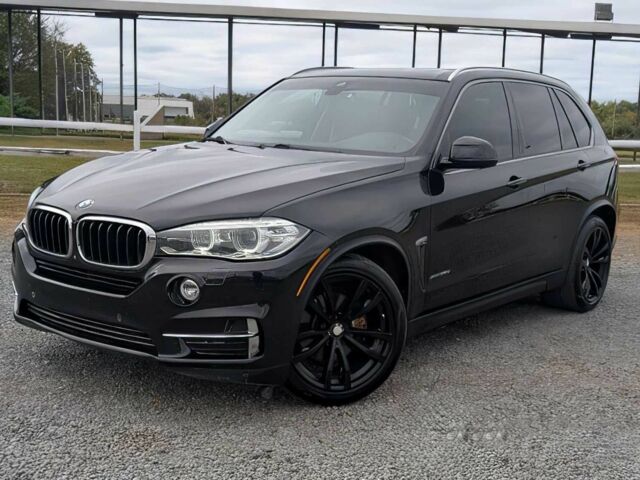 Черный БМВ Х5, объемом двигателя 3 л и пробегом 72 тыс. км за 16500 $, фото 2 на Automoto.ua