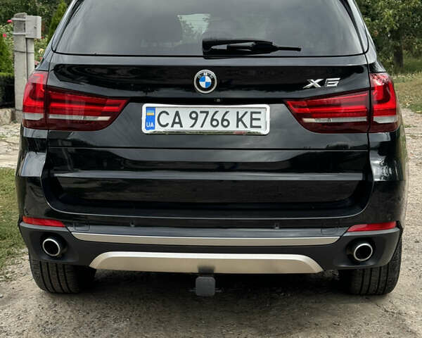 Черный БМВ Х5, объемом двигателя 3 л и пробегом 170 тыс. км за 32500 $, фото 7 на Automoto.ua