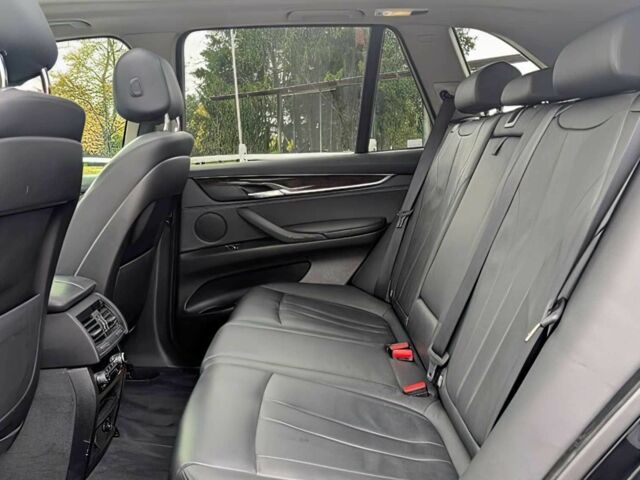 Черный БМВ Х5, объемом двигателя 3 л и пробегом 72 тыс. км за 16500 $, фото 13 на Automoto.ua