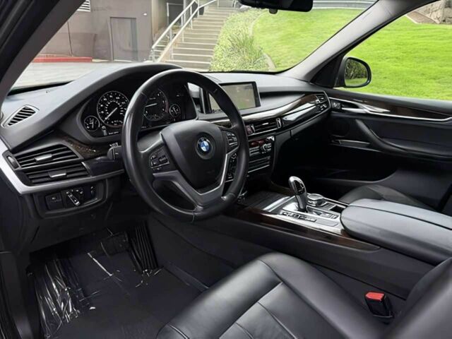 Чорний БМВ Х5, об'ємом двигуна 3 л та пробігом 75 тис. км за 25000 $, фото 8 на Automoto.ua