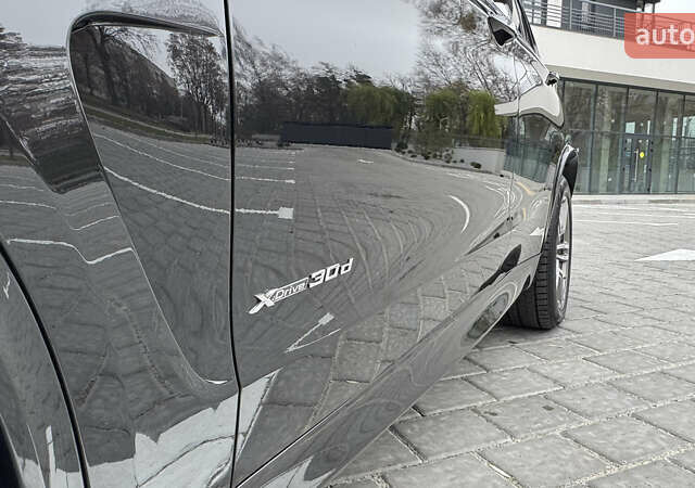 Чорний БМВ Х5, об'ємом двигуна 3 л та пробігом 144 тис. км за 32000 $, фото 34 на Automoto.ua