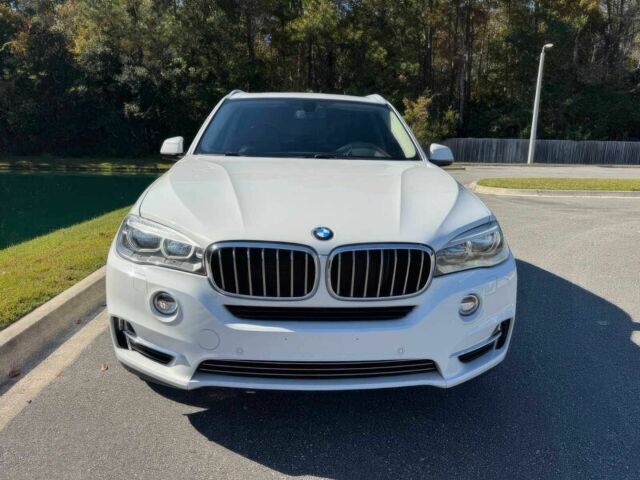 Чорний БМВ Х5, об'ємом двигуна 3 л та пробігом 73 тис. км за 14600 $, фото 1 на Automoto.ua