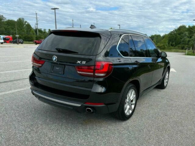 Черный БМВ Х5, объемом двигателя 3 л и пробегом 76 тыс. км за 11900 $, фото 5 на Automoto.ua