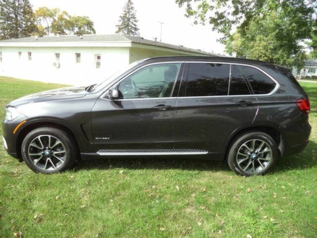 Черный БМВ Х5, объемом двигателя 3 л и пробегом 73 тыс. км за 12000 $, фото 4 на Automoto.ua