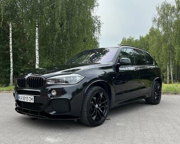 Черный БМВ Х5, объемом двигателя 2.99 л и пробегом 205 тыс. км за 34900 $, фото 1 на Automoto.ua