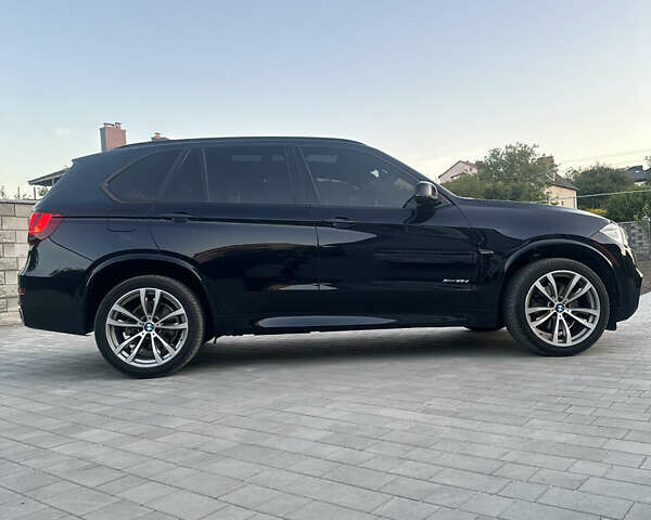 Чорний БМВ Х5, об'ємом двигуна 3 л та пробігом 320 тис. км за 25950 $, фото 5 на Automoto.ua