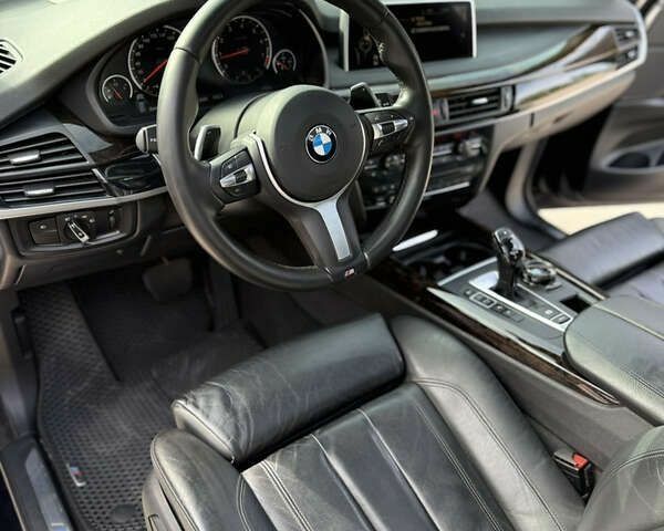 Черный БМВ Х5, объемом двигателя 3 л и пробегом 113 тыс. км за 24900 $, фото 12 на Automoto.ua