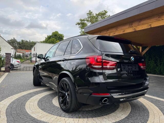 Чорний БМВ Х5, об'ємом двигуна 3 л та пробігом 120 тис. км за 18000 $, фото 4 на Automoto.ua