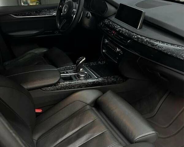 Черный БМВ Х5, объемом двигателя 3 л и пробегом 217 тыс. км за 26000 $, фото 1 на Automoto.ua