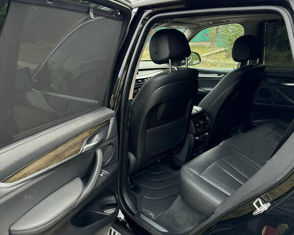 Черный БМВ Х5, объемом двигателя 3 л и пробегом 170 тыс. км за 32500 $, фото 15 на Automoto.ua