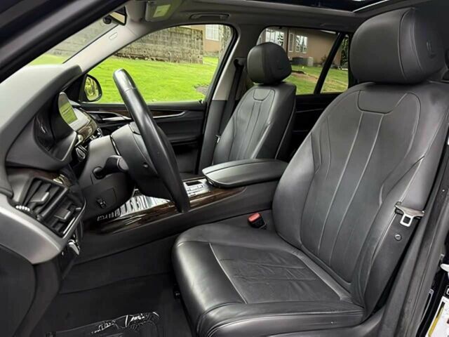 Чорний БМВ Х5, об'ємом двигуна 3 л та пробігом 75 тис. км за 25000 $, фото 9 на Automoto.ua