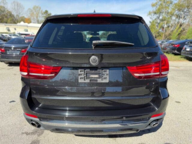 Черный БМВ Х5, объемом двигателя 3 л и пробегом 70 тыс. км за 9600 $, фото 4 на Automoto.ua