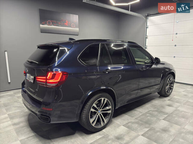 Чорний БМВ Х5, об'ємом двигуна 3 л та пробігом 218 тис. км за 33999 $, фото 83 на Automoto.ua