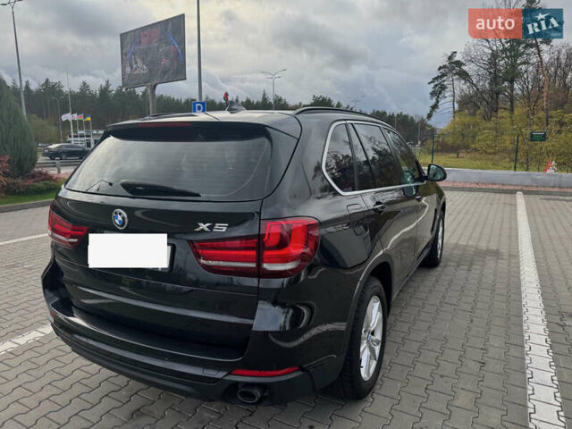 Черный БМВ Х5, объемом двигателя 2 л и пробегом 176 тыс. км за 25500 $, фото 1 на Automoto.ua