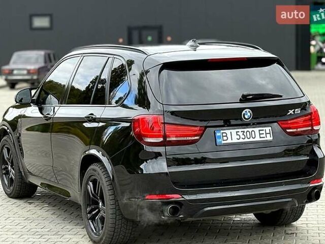 Черный БМВ Х5, объемом двигателя 3 л и пробегом 152 тыс. км за 24500 $, фото 3 на Automoto.ua