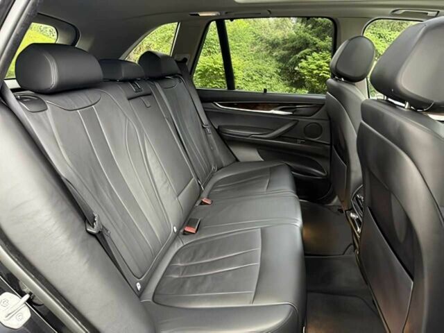 Чорний БМВ Х5, об'ємом двигуна 3 л та пробігом 75 тис. км за 25000 $, фото 15 на Automoto.ua