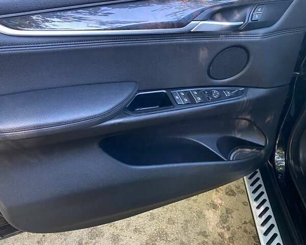 Чорний БМВ Х5, об'ємом двигуна 3 л та пробігом 125 тис. км за 32500 $, фото 2 на Automoto.ua