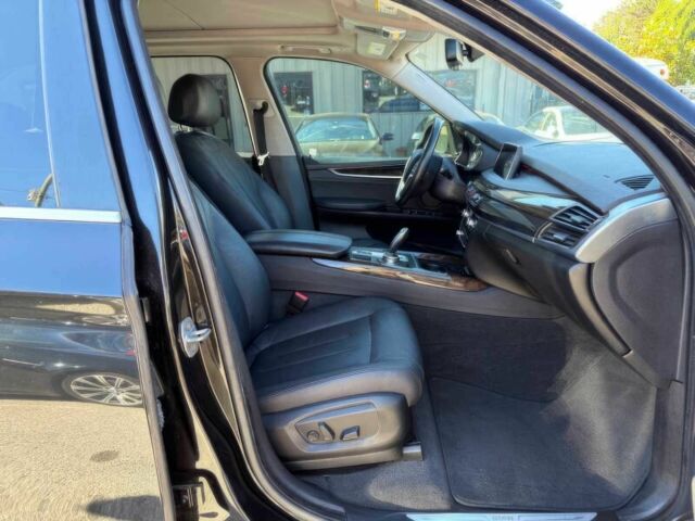 Черный БМВ Х5, объемом двигателя 3 л и пробегом 70 тыс. км за 9600 $, фото 7 на Automoto.ua