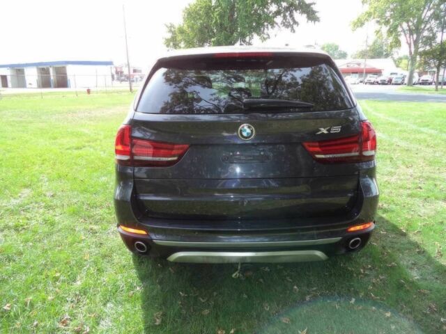 Черный БМВ Х5, объемом двигателя 3 л и пробегом 78 тыс. км за 19800 $, фото 6 на Automoto.ua
