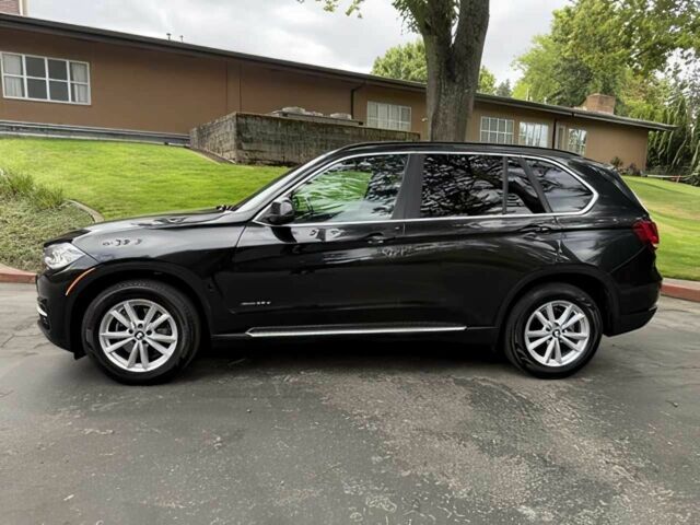 Чорний БМВ Х5, об'ємом двигуна 3 л та пробігом 75 тис. км за 25000 $, фото 3 на Automoto.ua