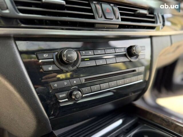 Черный БМВ Х5, объемом двигателя 3 л и пробегом 113 тыс. км за 24900 $, фото 28 на Automoto.ua