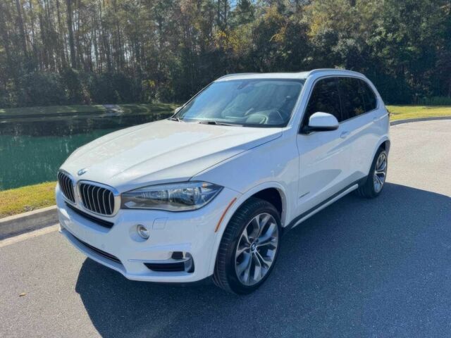 Чорний БМВ Х5, об'ємом двигуна 3 л та пробігом 73 тис. км за 14600 $, фото 2 на Automoto.ua