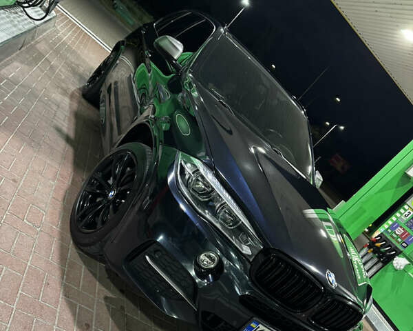 Чорний БМВ Х5, об'ємом двигуна 2.99 л та пробігом 162 тис. км за 40000 $, фото 2 на Automoto.ua