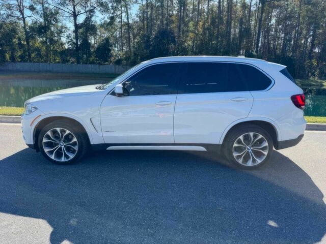 Чорний БМВ Х5, об'ємом двигуна 3 л та пробігом 73 тис. км за 14600 $, фото 4 на Automoto.ua