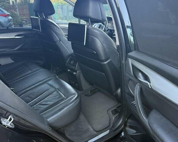 Черный БМВ Х5, объемом двигателя 2 л и пробегом 260 тыс. км за 24500 $, фото 14 на Automoto.ua